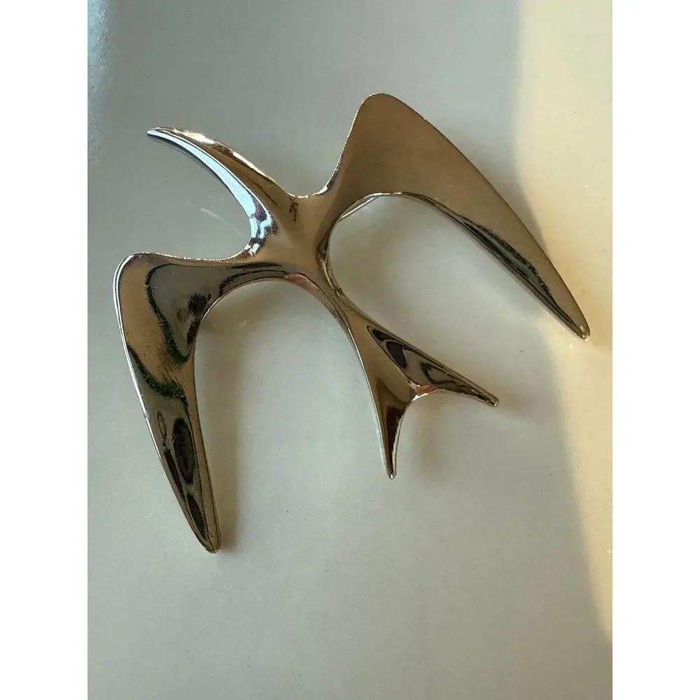 Sarah Coventry Trifari Bird in flight silver brooch